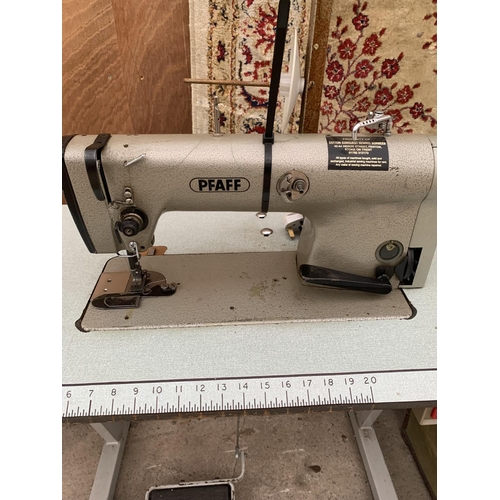 1212 - A VINTAGE PFAFF INDUSTRIAL SEWING MACHINE WITH TREADLE BASE