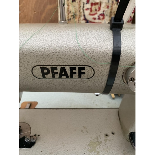 1212 - A VINTAGE PFAFF INDUSTRIAL SEWING MACHINE WITH TREADLE BASE