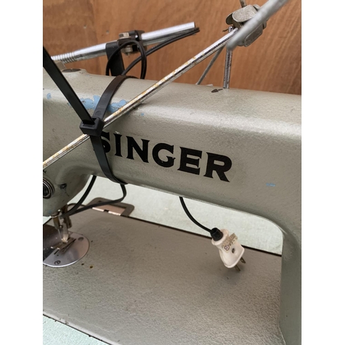 1213 - A VINTAGE SINGER INDUSTRIAL SEWING MACHINE WITH TREADLE BASE