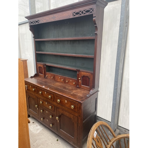 2205 - A GEORGE III OAK DRESSER, THE BASE ENCLOSING THREE LONG AND THREE SHORT DRAWERS AND TWO CUPBOARDS, T... 