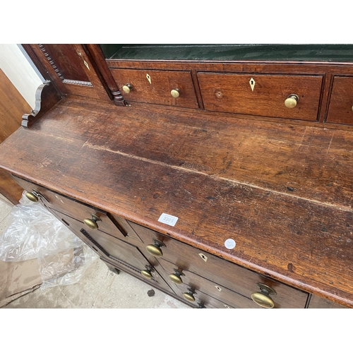 2205 - A GEORGE III OAK DRESSER, THE BASE ENCLOSING THREE LONG AND THREE SHORT DRAWERS AND TWO CUPBOARDS, T... 