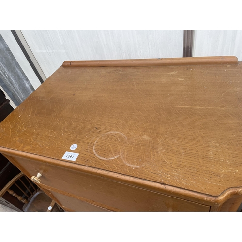 2207 - A MID 20TH CENTURY LIGHT OAK CHEST OF FOUR DRAWERS, 28