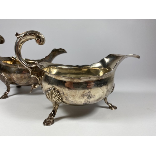 10A - A PAIR OF GEORGE III HALLMARKED SILVER SAUCE / GRAVY BOATS, POSSIBLY BY GEORGE SMITH II,  DATES TO L... 