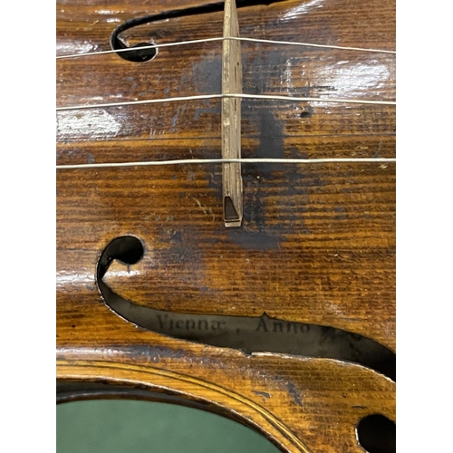 22 - A 19TH CENTURY CASED VIOLIN WITH PAPER LABEL TO INTERIOR - 'JOANNES GEORGIUS' (DATE DIFFICULT TO REA... 