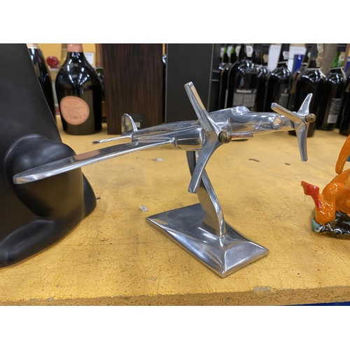 58 - A CHROME EFFECT MODEL OF AN AEROPLANE