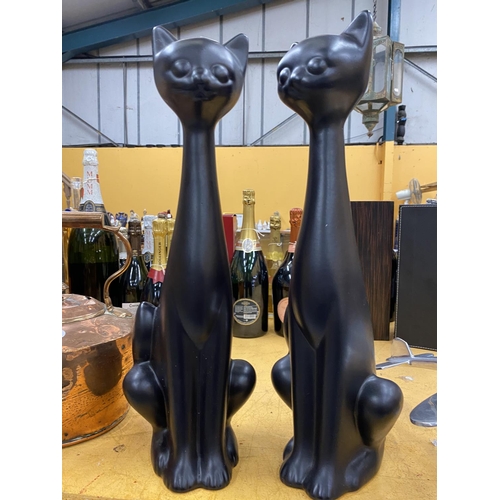 59 - A PAIR OF TALL BLACK CERAMIC CAT MODELS