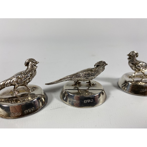 5A - A SET OF FOUR GEORGE V HALLMARKED SILVER PHEASANT PLACEHOLDERS, DATES TO CHESTER, 1913