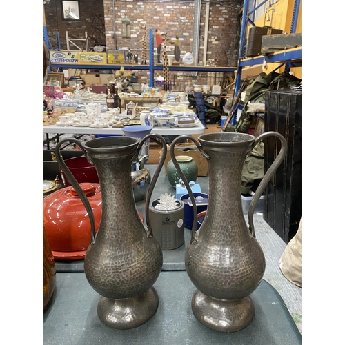 63 - A PAIR OF PEWTER ARTS AND CRAFTS STYLE TWIN HANDLE VASES HEIGHT 28CM