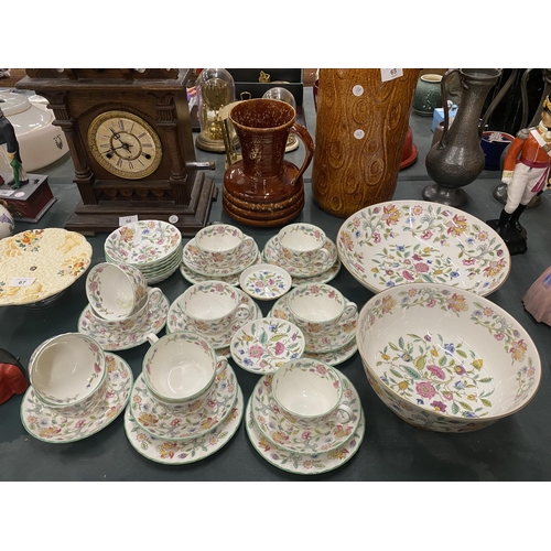 64 - A LARGE QUANTITY OF MINTON 'HADDON HALL' TEAWARE TO INCLUDE CUPS, SAUCERS, SIDE PLATES, LARGE SERVIN... 