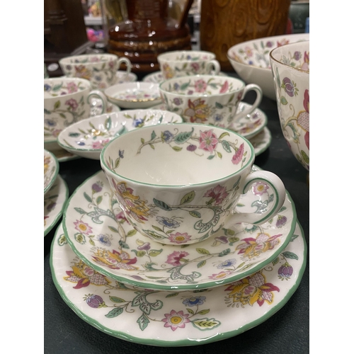64 - A LARGE QUANTITY OF MINTON 'HADDON HALL' TEAWARE TO INCLUDE CUPS, SAUCERS, SIDE PLATES, LARGE SERVIN... 