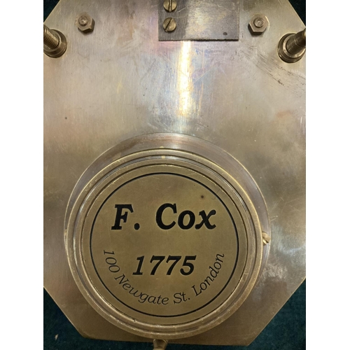 185 - A BOXED BRASS SUNDIAL COMPASS BY COX OF LONDON