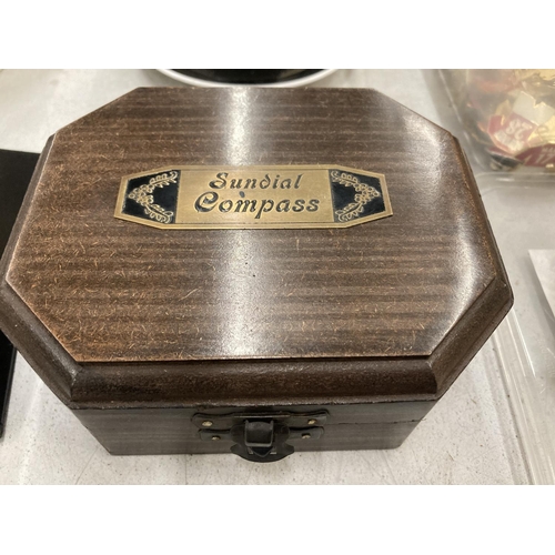 185 - A BOXED BRASS SUNDIAL COMPASS BY COX OF LONDON