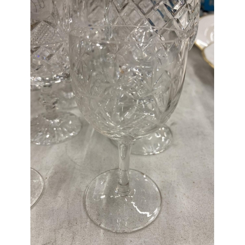 192 - A QUANTITY OF CUT GLASS GLASSES TO INCLUDE DECANTERS, WINE, SHERRY, PORT, ETC