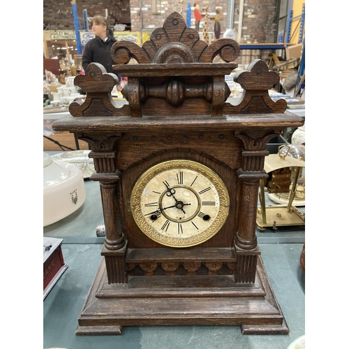 68 - AN EDWARDIAN MAHOGANY CASED MANTLE CLOCK WITH COLUMN DETAIL - MISSING KEY AND PENDULUM