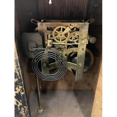 68 - AN EDWARDIAN MAHOGANY CASED MANTLE CLOCK WITH COLUMN DETAIL - MISSING KEY AND PENDULUM