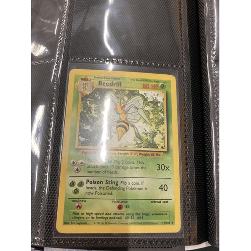 74 - A FOLDER OF POKEMON CARDS TO INCLUDE 1999 BASE SET, TOPPS SERIES 1 INCLUDING CHARIZARD AND HOLOS