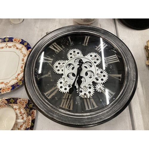85 - A WALL CLOCK WITH EXPOSED MOVING PARTS DIAMETER 33CM