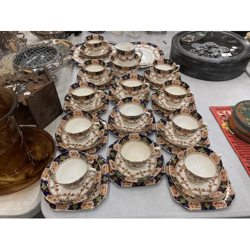 86 - A VINTAGE ST MICHAEL TEASET TO INCLUDE CAKE PLATES, SUGAR BOWL, CREAM JUG, CUPS, SAUCERS AND SIDE PL... 