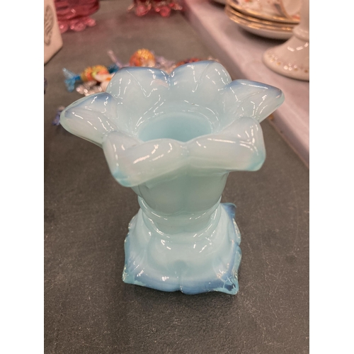 117 - A FRENCH PALE BLUE GLASS CANDLESTICK HEIGHT 9CM