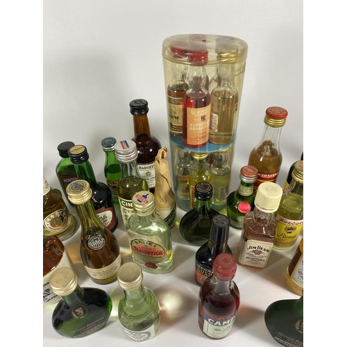 404 - A LARGE COLLECTION OF ASSORTED WHISKY & SPIRITS MINIATURES