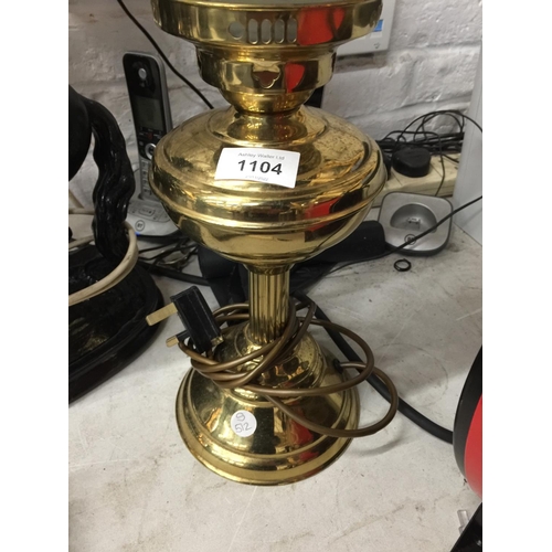 1104 - A BRASS VICTORIAN STYLE OIL LAMP WITH FROSTED GLASS  SHADE AND GLASS FUNNEL