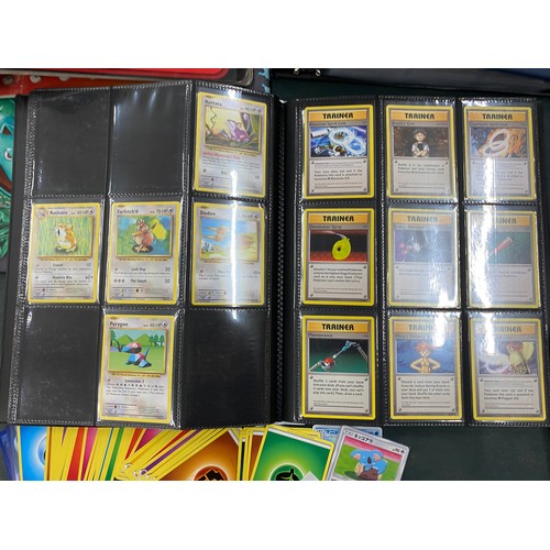 74 - A FOLDER OF POKEMON CARDS TO INCLUDE 1999 BASE SET, TOPPS SERIES 1 INCLUDING CHARIZARD AND HOLOS