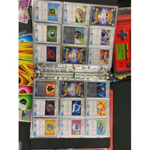 75 - A LARGE FOLDER OF POKEMON CARDS TO INCLUDE 25TH ANNIVERSARY JAPANESE SETS, ETC