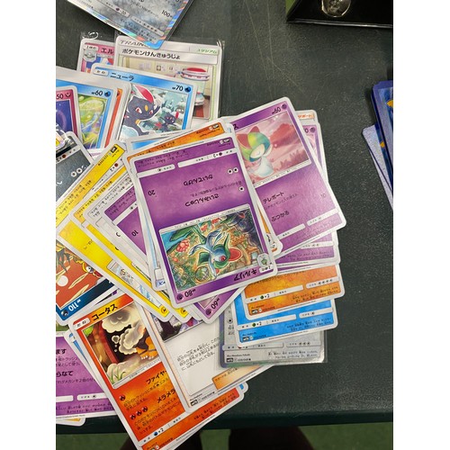 76A - A COLLECTION OF JAPANESE POKEMON CARDS TO INCLUDE A QUANTITY OF HOLOS