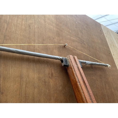 1214A - A SCRATCH BUILT HOME MADE CROSS BOW IN WORKING ORDER BUT NO WARRANTY