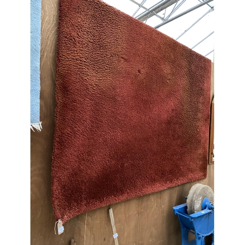 2195 - A LARGE MODERN RED RUG