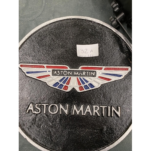 132A - A CAST ASTON MARTIN SIGN DIAMETER 24CM