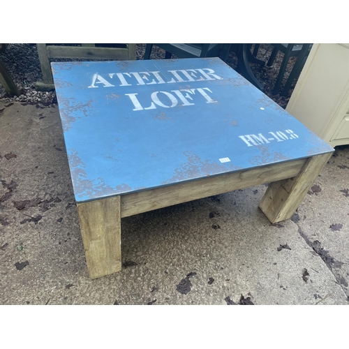 2677 - A RETRO INDUSTRIAL STYLE COFFEE TABLE WITH 