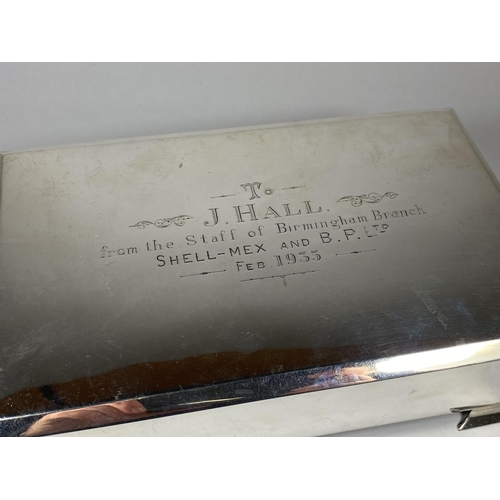 13 - AN ART DECO 1930'S HALLMARKED BIRMINGHAM SILVER OVER-SIZED CIGARETTE BOX WITH SHELL-MEX & B.P INSCRI... 