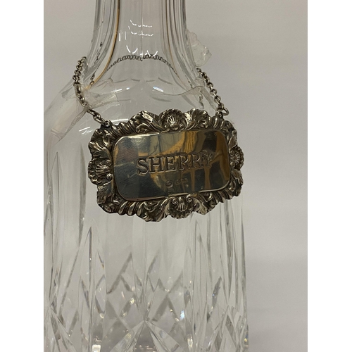 544 - A WATERFORD CUT GLASS CRYSTAL DECANTER & STOPPER WITH HALLMARKED SILVER SHERRY DECANTER LABEL,