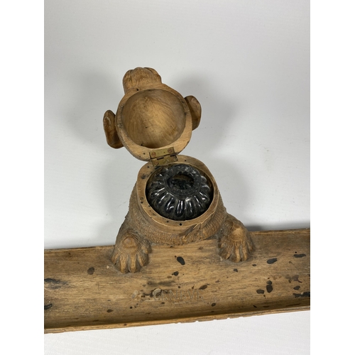 8 - A 19TH CENTURY BAVARIAN BLACK FOREST CARVED DOG INKWELL WITH GENEVE MARK, LENGTH 24.5CM