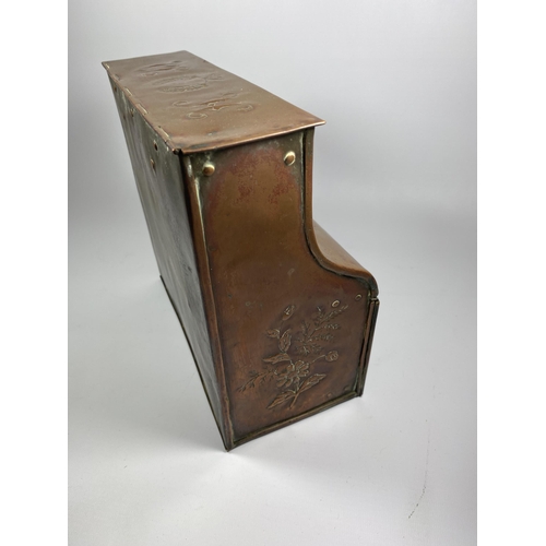 31 - AN ARTS AND CRAFTS 1912 COPPER DESKSTAND WITH LIFT UP TOP SECTION, TWO SMALL DRAWERS AND LOWER DOORS... 