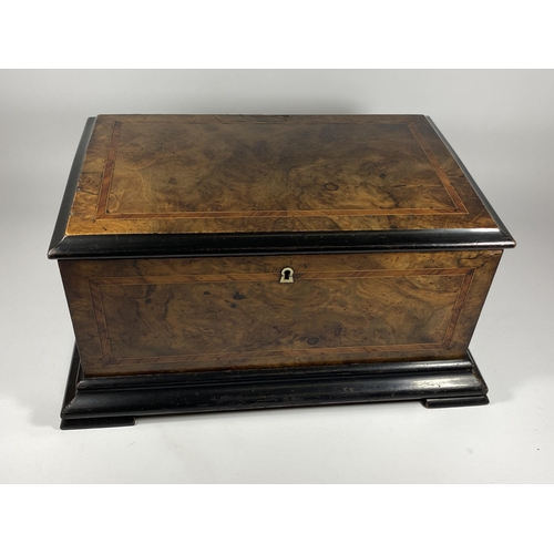 34 - AN INLAID MAHOGANY MUSICAL BOX WITH BELLS