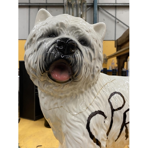 52 - A LARGE CERAMIC MODEL OF A DOG WITH ADDED SPRATTS DESIGN, HEIGHT 43CM A/F