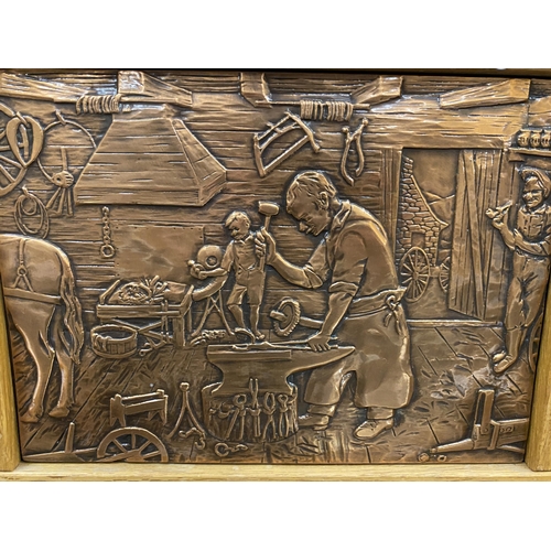 55 - A WOODEN FRAMED COPPER PLAQUE OF A BLACKSMITH