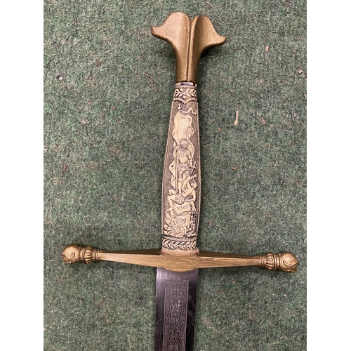 63 - A VINTAGE BONE STYLE HANDLED SWORD WITH WOODEN SCABBARD