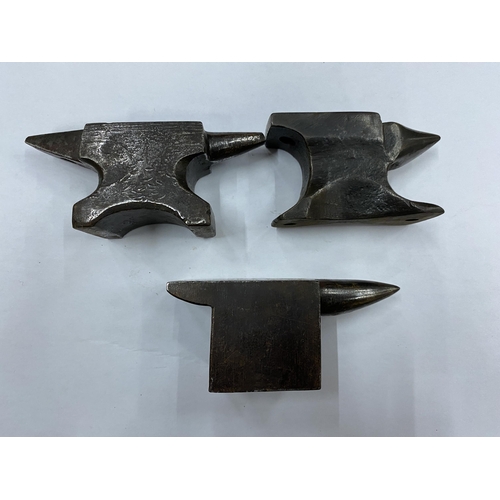 68 - THREE MINIATURE HEAVY SAMPLE ANVILS