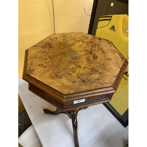 87 - A FLORAL INLAID WALNUT OCTAGONAL SEWING TABLE ON TRIPOD BASE