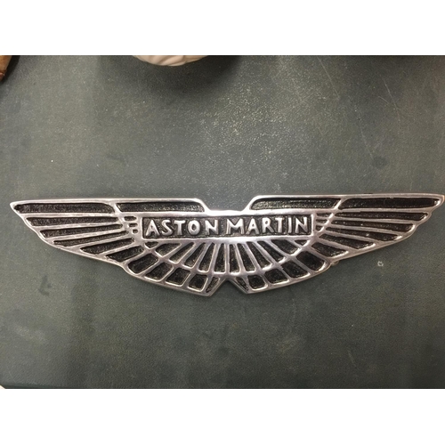 101 - A CHROME ASTON MARTIN SIGN