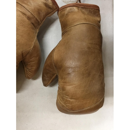 105 - A PAIR OF VINTAGE BOXING GLOVES