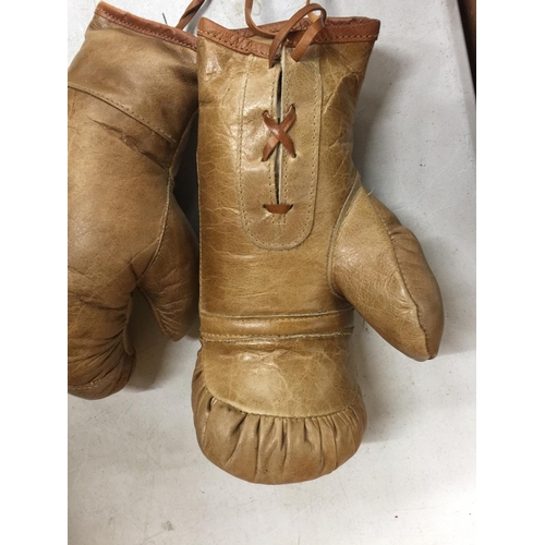 105 - A PAIR OF VINTAGE BOXING GLOVES