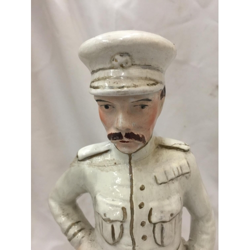 108 - A LARGE VICTORIAN STAFFORDSHIRE LORD KITCHENER AND A PAIR OF FIGURES ON CHAISE LONGUES - BOTH A/F