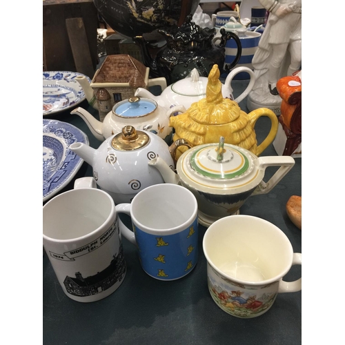 109 - A QUANTITY OF TEAPOTS TO INCLUDE BURLEIGHWARE, SADLER, POOLE, ETC PLUS MUGS