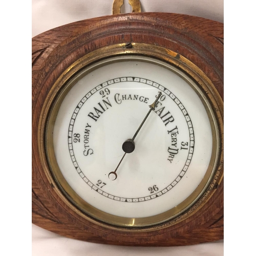 129 - AN ARTS & CRAFTS STYLE BAROMETER