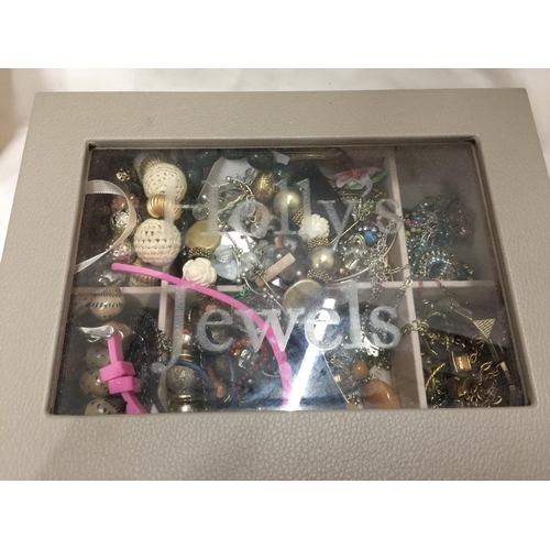 130 - A BOX CONTAINING A QUANTITY OF COSTUME JEWELLERY TO INCLUDE BEADS, NECKLACES, BRACELETS, RINGS, EARR... 