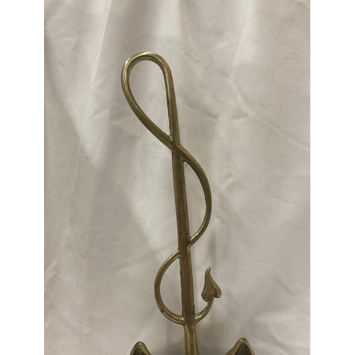 151 - A VINTAGE BRASS FOX AND WHIP DOORSTOP HEIGHT 43CM